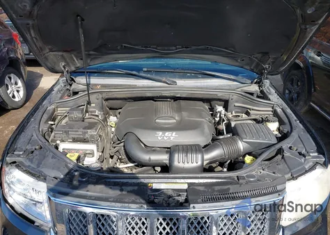 2013 Jeep Grand Cherokee Overland z USA, uszkodzony, nr VIN 1C4RJFCG5DC531716